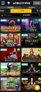 Mobile Wins Casino mobile live dealer games screenshot showing tables including blackjack, roulette and baccarat on smartphone screen – tested